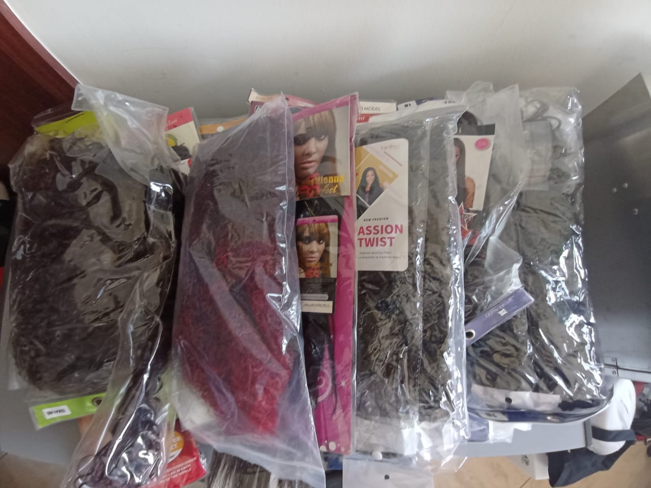 Human and Synthetic Hair – straight, curly, wavy – for weaves, braids, & wigs – various lengths, straight, wavy, curly, etc. Bulk of colours are 1 and 1B.